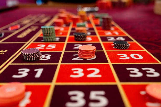 Roulette table interface on bintang168 Evolution Gaming showing betting layout and live wheel